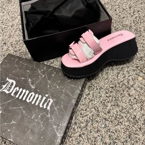 Demonia Light Pink Platform Slides